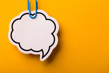 Blank Speech Bubble Paper Isolated On Yellow Background