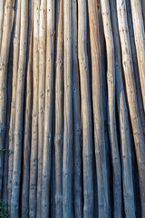 old dilapidated gray wooden posts, gray wood texture