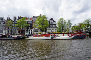 Obraz premium Holland, Amsterdam, city views, navigation channels and monuments
