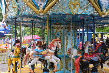 Fototapeta na wymiar kids carousels in belarusian city park