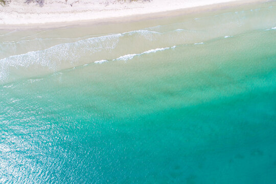 Top view aerial image of an stunning beautiful sea landscape white sand beach with turquoise water copy space,
