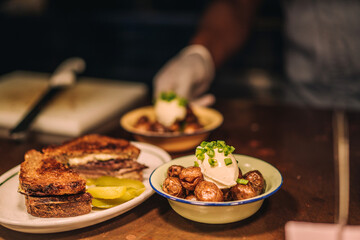 chef plating the food at the cafe
