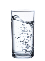 pouring water on a glass on white background clipping path