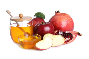 Honey, apples and pomegranates on white background. Jewish New Year (Rosh Hashanah) holiday
