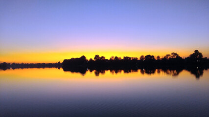 Obraz premium Forest lake at sunset