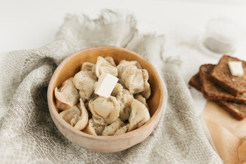 dumplings with butter and slices of bread