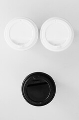 paper cups for coffee on a white background top view. waste recycling