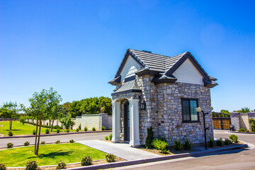 Fototapeta premium Small Gate House At Subdivision Entrance