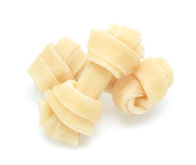 bones and colorful sticks for dog treat with vitamin and oral health on white background