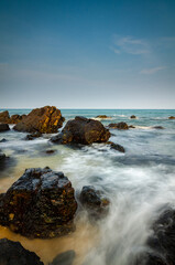 Fototapeta na wymiar amazing nature landscape at kemasik beach Terengganu, Malaysia against blue sky background