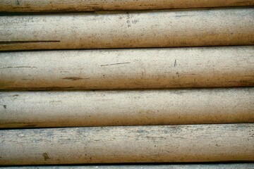 Dry bamboo arranged in a wall Use as wallpaper