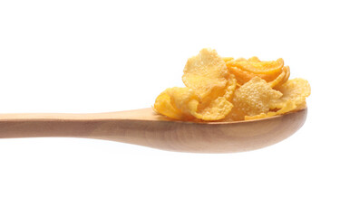 Cornflakes on spoon wood isolated on white background