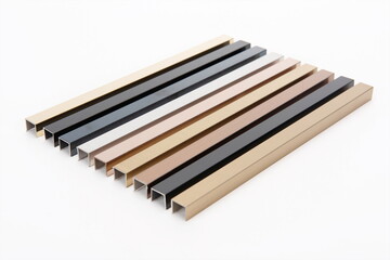Various materials and colors of metal and steel are placed flat against a white background.