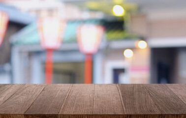 Wood Table Top in Blur Background room interior with empty copy space.