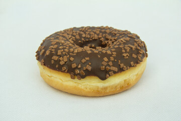 donut with chocolate icing on white background