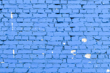 Texture of uneven blue brick wall. Texture old blue-white brick background