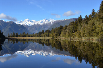 Fototapeta na wymiar Lake Matheson, near the Fox Glacier in South Westland, New Zealand, is famous for its reflected views of Aoraki/Mount Cook and Mount Tasman.
