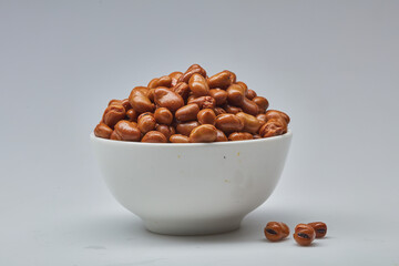 Fava beans (foul) shot on white background.