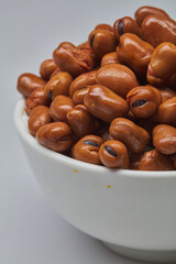 Fava beans (foul) shot on white background.