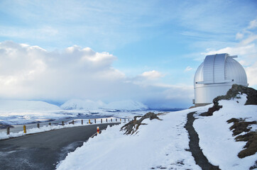 Winter with heavy snow fall at Mt John. It's a large hill overlooking Lake Tekapo, with 360-degree panoramic views of the Mackenzie Basin. The Observatory is the best place for stargazing at night.