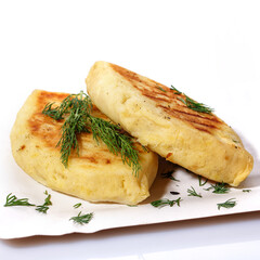 Zrazy with dill on a paper plate on a white background. National Ukrainian, Lithuanian, Polish and Belarusian cuisine.