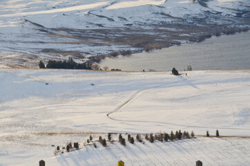 Winter with heavy snow fall at Mt John. It's a large hill overlooking Lake Tekapo, with 360-degree panoramic views of the Mackenzie Basin. The Observatory is the best place for stargazing at night.