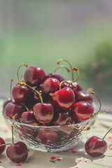 cherries in a glass bowl
