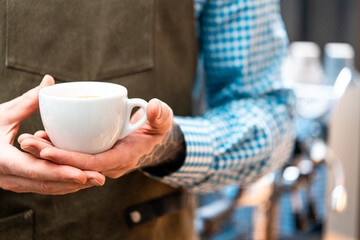 Close Up Of Man Barista Holding Fresh Dark Coffee. Perfect Breakfast. Stay Home Concept. Preparing Coffee by Amateur At Home Kitchen