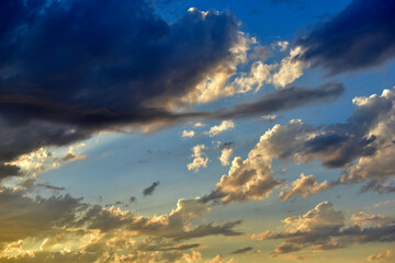 Blue sky with beautiful blue red clouds in the evening