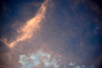 Blue sky with beautiful blue red clouds in the evening