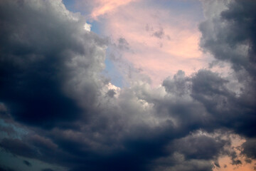 Fototapeta premium Blue evening sky with beautiful blue clouds in summer