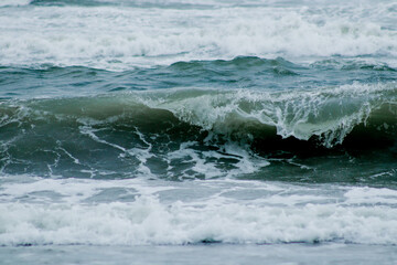 wave breaking on the beach