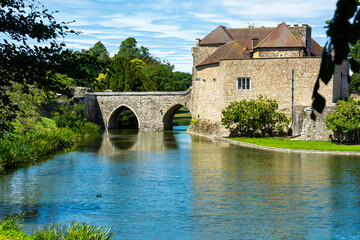 Leeds Castle in Kent, England viewed from a public footpath that runs through the grounds