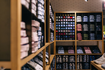 luxury men's store window display, shirts, ties, cufflinks.