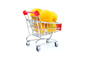 Apricots in a basket isolated on a white background. Food trade concept.