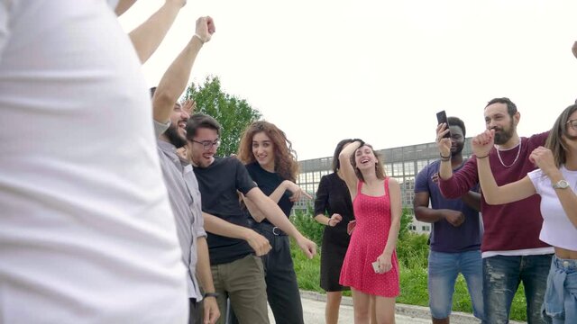Slow motion shot of dancing group of people