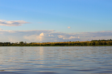 Local boat tour at wild Amazon River across Rio Negro in Leticia, Colombia