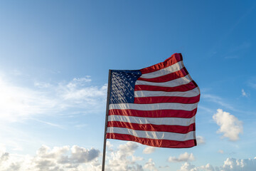 american flag and blue sky