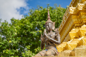  Traditional figure of deva (Angel) , clasping hand  , in Thai style at the public temple of southern region of Thailand.