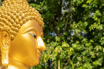 golden buddha image statue in south of Thailand