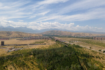 Fototapeta na wymiar Mountain landscape from the southern outskirts of Bishkek. Kyrgyzstan.