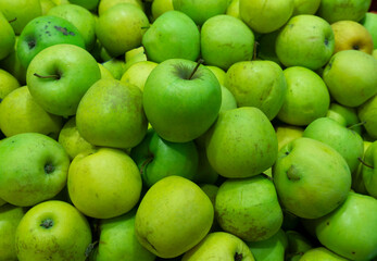 Green apple Raw fruit and vegetable backgrounds overhead perspective, healthy organic fresh produce. Green Apple Background, shallow depth of field.  Apple Fruit.