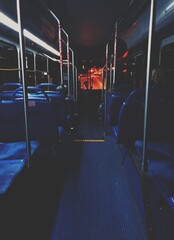 City bus riding at night on the back seat