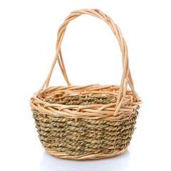 Basket woven from natural vine isolated on a white background.