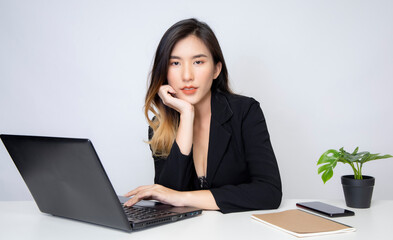 Asian women are starting a new business in the online market. Asian women checking products, preparing to deliver products to customers. SME Concept