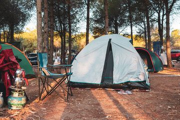 tents in the camping area. camping new normal new vacation. Camping tent in tree area.