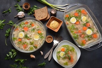Home made aspic, jellied chicken meat with herbs and carrots. Traditional Russian dish holodets. Served with bread and mustard or/and horseradish