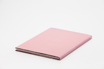 Pink Hardback Book With Copy Space Isolated on White Background