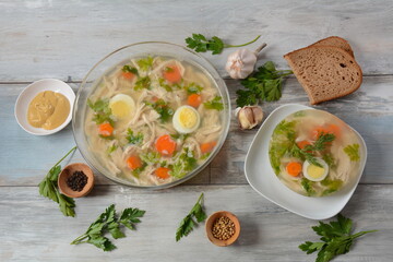Home made aspic, jellied chicken meat with herbs and carrots. Traditional Russian dish holodets. Served with bread and mustard or/and horseradish