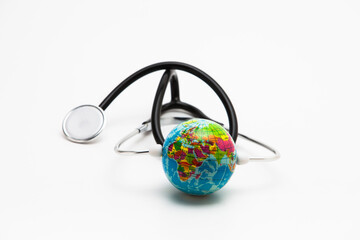 Stethoscope World globe concept on white background